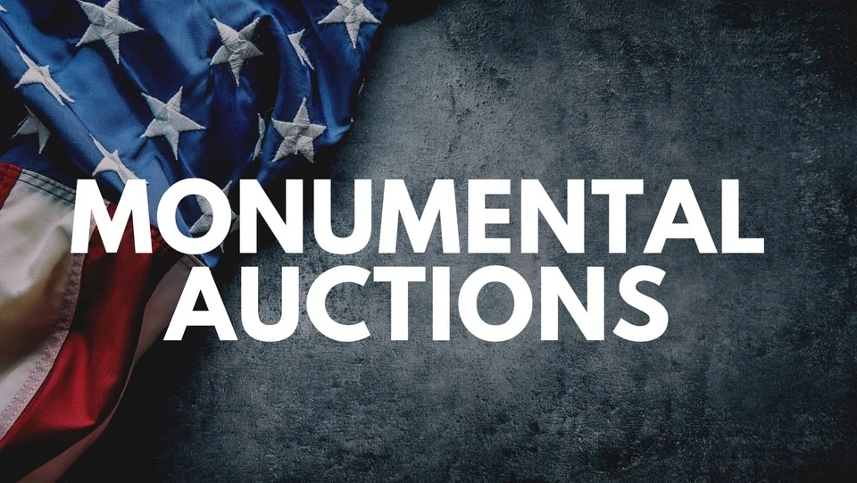 Monumental Auctions logo